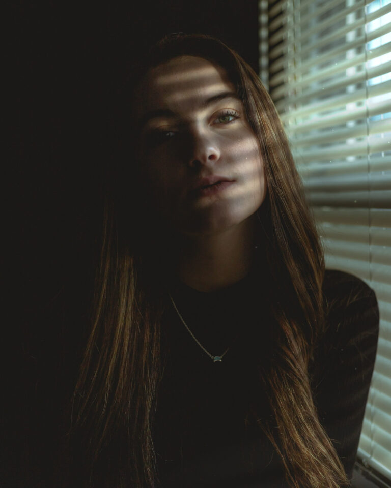 moody-window-indoor-giirl-photo